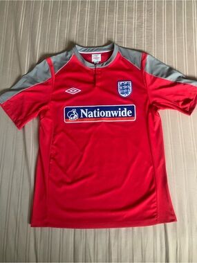 Umbro Red Soccer Jersey with Gray Accents and Nationwide Logo